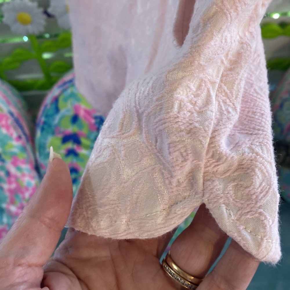 Light pink textured fabric shorts
